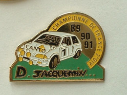 Pin's VOITURE DE RALLYE - DOROTHEE JACQUEMIN - CITROËN AX - CHAMPIONNE DE FRANCE 2ND DIVISION - 89/90/91 - Citroën