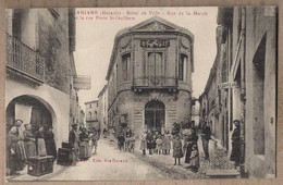 CPA 34 - ANIANE Hôtel De Ville Rue De La Mairie Et La Rue Porte St-Guilhem SUPERBE ANIMATION MAGASINS - Aniane