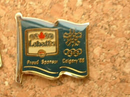 PIN'S BIERE LABBATT'S - PROUD SPONSOR J.O CALGARY 88 - Bière