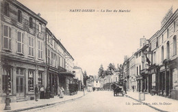 CPA FRANCE - 52 - SAINT DIZIER - La Rue Du Marché - Animée - Saint Dizier