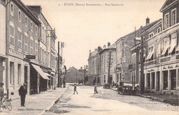 CPA FRANCE - 55 - ETAIN - Reconstruit - Rue Nationale - Automobile - Etain