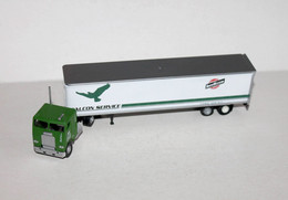 CAMION POIDS LOURD 1/87 TRACTEUR BNT + SEMI REMORQUE FALCON SERVIC NORTH WESTERN - AUTOMOBILE MINIATURE (1712.64) - Massstab 1:87