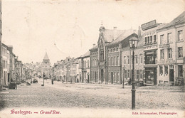 CPA - Belgique - Bastogne - Grand' Rue - Edit. Schumacher - Oblitération Etoile Redu 1908 - Animé - Clocher - Bastogne