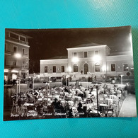 Cartolina Porto S. Giorgio - Piazza Stazione - Notturno. Viaggiata 1957 - Fermo