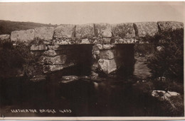 REAL PHOTOGRAPHIC POSTCARD - LEATHER TOR BRIDGE - DARTMOOR WITH DOUSLAND YELVERTON POSTMARK DEVON 1929 - Dartmoor