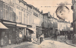 CPA - FRANCE - 55 - BAR LE DUC - La Rue Du ... - Animée Commerce - Bar Le Duc