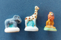 ANIMAUX SAUVAGES - LOT DE 3 FEVES BRILLANTES - ELEPHANT-GIRAFE-LION - Tiere