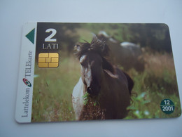 LATVIA USED  CARDS  ANIMALS  HORSES  WWF - Caballos