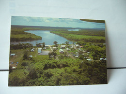 Delcampe - GUYANE FRANCAISE MONTSINERY VUE AERIENNE DU VILLAGE ET LA RIVIERE CPM - Sonstige & Ohne Zuordnung