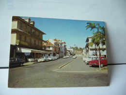 Delcampe - GUYANE FRANCAISE CAYENNE RUE DU GENERAL DE GAULLE ET PLACE DES PALMISTES CPM - Cayenne