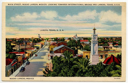 United States 1937 Postcard Laredo, Texas - Main Street, Nuevo Laredo Mexico; San Antonio & Laredo RPO Postmark - Laredo