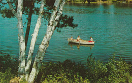 A Rowboat Centering A Peaceful Lake Scene - Rowing