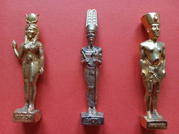 LOT DE 3 FEVES METAL DOREES OR ROIS ET REINES D'EGYPTE - AMON - AKHEMATON - HATHOR - History