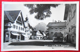 CPSM 195?  Autriche - Reutte In Tirol- Hauptstrasse -Hotel Post, Friseur Adalbert Singer, Bus Autocar - Reutte