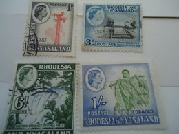 RHODESIA NYASALAND USED STAMPS 4 LOT - Rhodesia & Nyasaland (1954-1963)