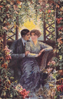 Couples - Houloubek - Au Berceau De L'amour - Illustrateur - Couple Assis Au Milieur Des Fleurs - Carte Postale Ancienne - Coppie