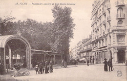 FRANCE - 03 - VICHY - Promenoirs Couverts Et Rue Canin Gridaine - Carte Postale Ancienne - Vichy