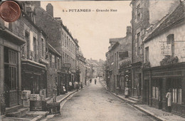 61 - Carte Postale Ancienne De  PUTANGES   Grande Rue - Putanges