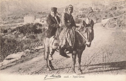 Types Corses * Homme Et Femme Du Pays En Route Sur Un âne * Corse - Autres & Non Classés