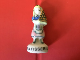 Fève Brillante Pied Blanc LES NOUVEAUX COMMERÇANTS NORDIA 1995 Mme Pâtisserie - Anciennes