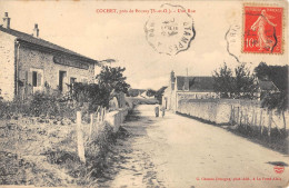 CPA 91 COCHET / PRES DE BOURAY / UNE RUE / RESTAURANT - Autres & Non Classés