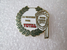 PIN'S    TOTAL   PARIS DAKAR 91  Email Grand Feu - Rallye