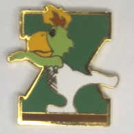 Pin's X° Jeux Panaméricains De 1987 0 INDIANAPOLIS - Perroquet Mascotte  à La Barre Fixe - Usoc - M227 - Gymnastics