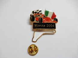 Superbe Pin's , Auto F1 Ferrari , Formule 1 , Grand Prix De Monza 2004 , Verso Quadrillé , Non Signé - Ferrari