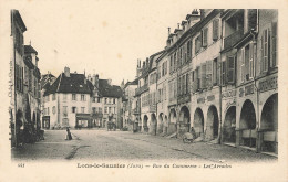 Lons Le Saunier * La Rue Du Commerce Et Les Arcades * Magasins - Lons Le Saunier