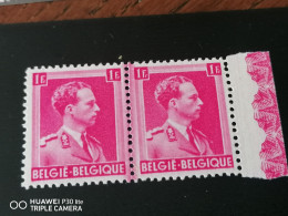 428 ** GEKLEURDE TANDING TUSSEN ZEGELS - 1931-1960