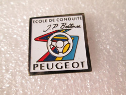 PIN'S    PEUGEOT  ECOLE DE CONDUITE  JEAN PIERRE BELTOISE - Peugeot