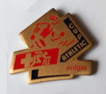 UU373 Pin's Athlétisme Cup Athletic Erdgas SUISSE Achat Immédiat - Athlétisme