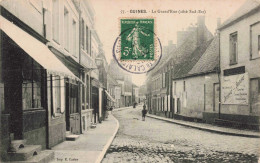 62 - GUINES - S14267 - La Grand'Rue - Côté Sud Est - Decuppe Bigourd Café - En L'état Pli -L23 - Guines