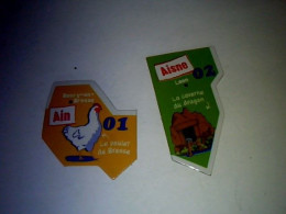 Publicitè Magnet Stickers X 2  Le Gaulois Thème Départements Français L Ain 01 Et L'Aisne 02 - Magnets