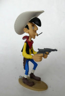 FIGURINE EN RESINE LUCKY LUKE ATLAS 01  (3) EN LOOSE Micro Fellure Au Cou - Autres & Non Classés