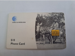 DOMINICA / $10,- CHIP  CARD / DOM - C1/ MAN RIDING DONKEY      Fine Used Card  ** 13339 ** - Dominica