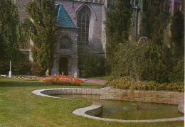 CPM Hondschoote Le Jardin Public (bassin Et Portait Eglise) Neuve - Hondshoote