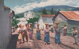 Guatemalan Women Carrying Water Home - Guatemala