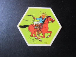 TINTIN AUTOCOLLANT LA VACHE QUI RIT  TINTIN A CHEVAL   HERGE - Tintin