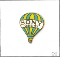 Pin's Transport - Montgolfière / Ballon Sony Cassettes 1989- Rayures Vertes Et Jaunes. Est. Sony 1989. Zamac. T943-01 - Montgolfier