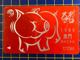 MACAU  1995 CHINESE LUNAR NEW YEAR OF THE PIG PHONE CARD VERY FINE AND CLEAN UNUSED - Macau