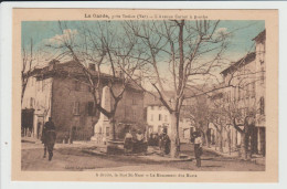 LA GARDE - VAR - L'AVENUE CARNOT A GAUCHE - A DROITE LA RUE SAINT MAUR - LE MONUMENT AUX MORTS - La Garde