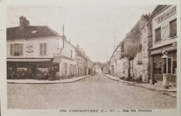 Cpa FAREMOUTIERS 77 - Rue Des Moutiers (Café De Paris, Commerces, Serrurerie) - Faremoutiers