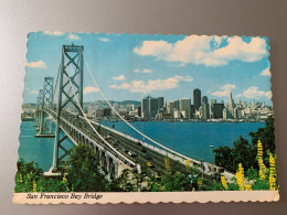 SAN FRANCISCO THE BAY BRIDGE AS SEEN FROM YERBA BUENA ISLAND THE CITY SPARKLES IN THE DISTANCE USA ETATS-UNIS CPM 1985 - San Francisco