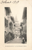 St Jean Pied De Port * 1909 * La Rue D'espagne Et L'église * Commerces Magasins Villageois - Saint Jean Pied De Port