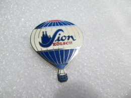 PIN'S    MONTGOLFIERE   BALLON   SION KOLSCH   BIERE   Email De Synthese - Montgolfier