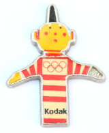 Rare Pin's KODAK - La Marionnette Du Voleur De Couleurs - Anneaux Olympiques - Albertville 92 ??? - M316 - Fotografie