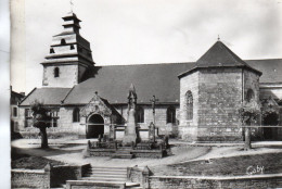 LE FAOUET L'EGLISE LE CALVAIRE ET LE MONUMENT AUX MORTS CPSM 10X15 TBE - Faouët