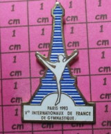 517 Pin's Pins / Beau Et Rare / SPORTS / PARIS 1993 Ve INTERNATIONAUX DE FRANCE DE GYMNASTIQUE TOUR EIFFEL - Gymnastique