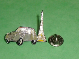 TB3CC / Pin's / Automobile : Voiture 2CV Citroen  , Tour Eiffel    ( état ,voir Scan ) - Citroën